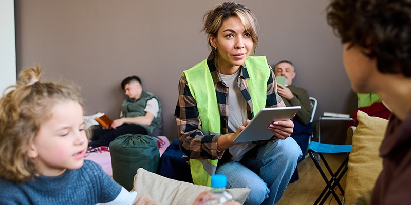 Social worker on tablet